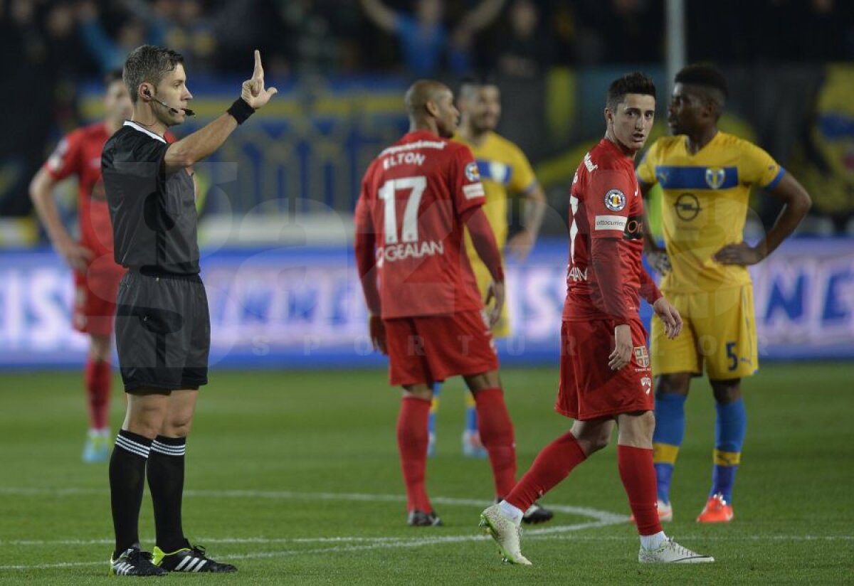 FOTO şi VIDEO "Tocaţi" de arbitrul Radu Petrescu, roş-albii au plecat cu un punct de la Ploieşti » Petrolul - Dinamo 2-2