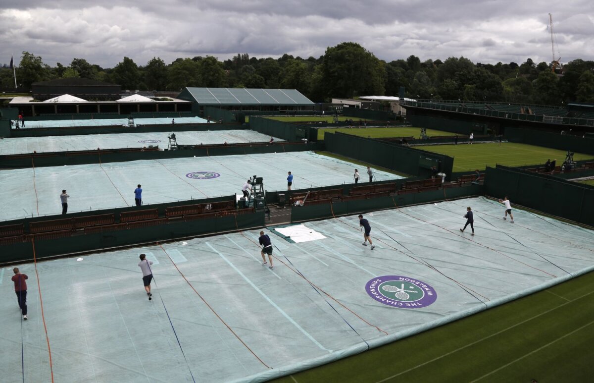 FOTO Ploaia universală » Chiar şi cele mai mari turnee depind de capriciile vremii