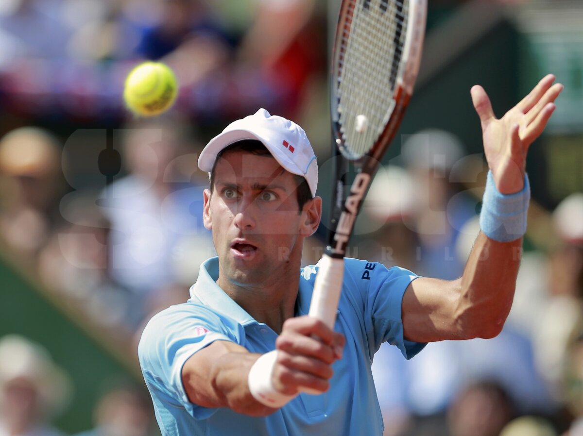 GALERIE FOTO Regele zgurii » Rafael Nadal a cîştigat pentru a 9-a oară trofeul de la Roland Garros! L-a învins pe Novak Djokovici în 4 seturi