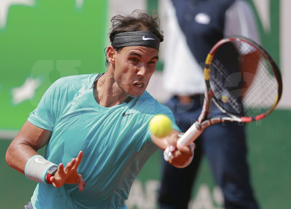 GALERIE FOTO Regele zgurii » Rafael Nadal a cîştigat pentru a 9-a oară trofeul de la Roland Garros! L-a învins pe Novak Djokovici în 4 seturi