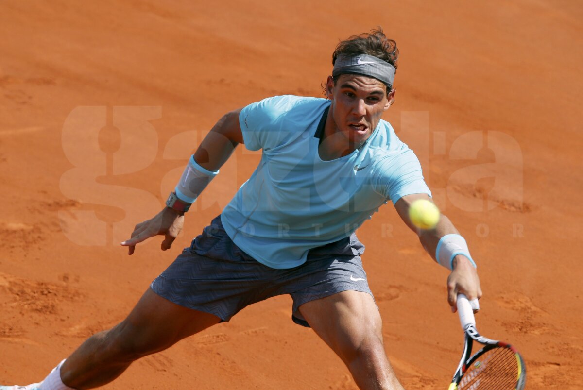 GALERIE FOTO Regele zgurii » Rafael Nadal a cîştigat pentru a 9-a oară trofeul de la Roland Garros! L-a învins pe Novak Djokovici în 4 seturi