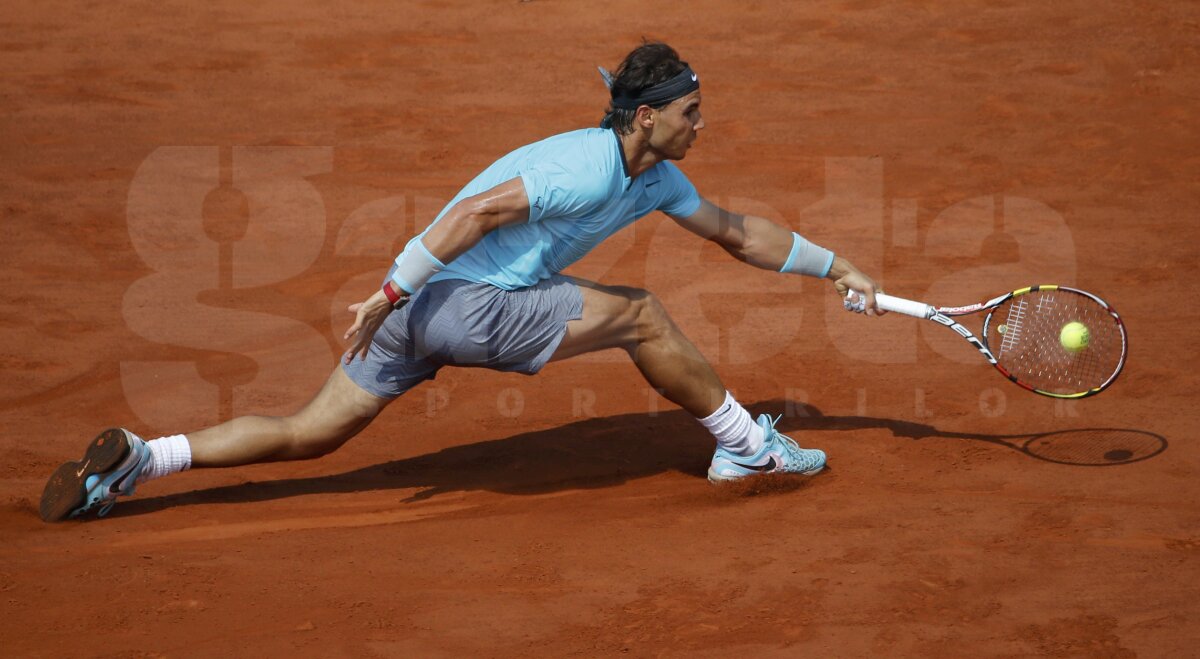 GALERIE FOTO Regele zgurii » Rafael Nadal a cîştigat pentru a 9-a oară trofeul de la Roland Garros! L-a învins pe Novak Djokovici în 4 seturi