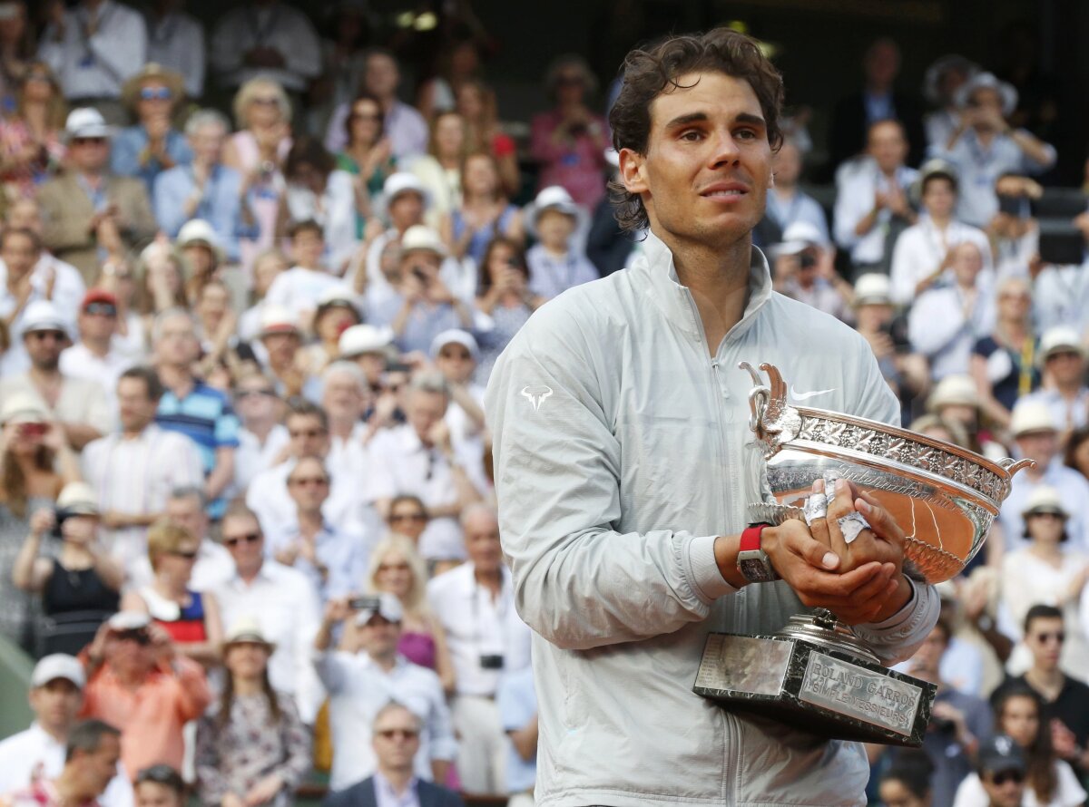 GALERIE FOTO Regele zgurii » Rafael Nadal a cîştigat pentru a 9-a oară trofeul de la Roland Garros! L-a învins pe Novak Djokovici în 4 seturi