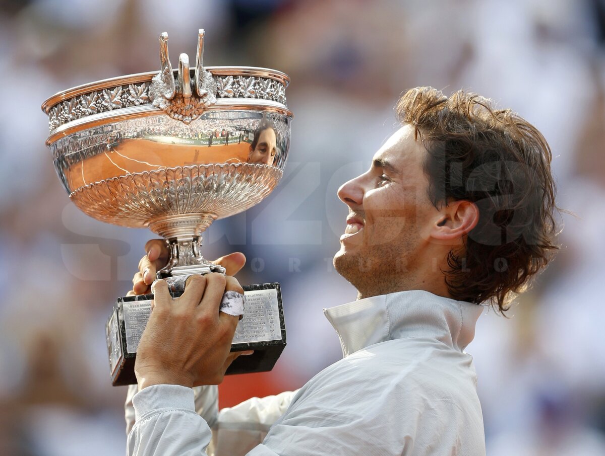GALERIE FOTO Regele zgurii » Rafael Nadal a cîştigat pentru a 9-a oară trofeul de la Roland Garros! L-a învins pe Novak Djokovici în 4 seturi