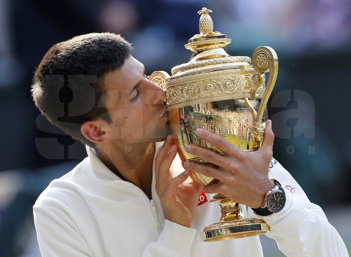 GALERIE FOTO Dramatic! Novak Djokovici cîştigă trofeul la Wimbledon după 5 seturi spectaculoase cu Roger Federer