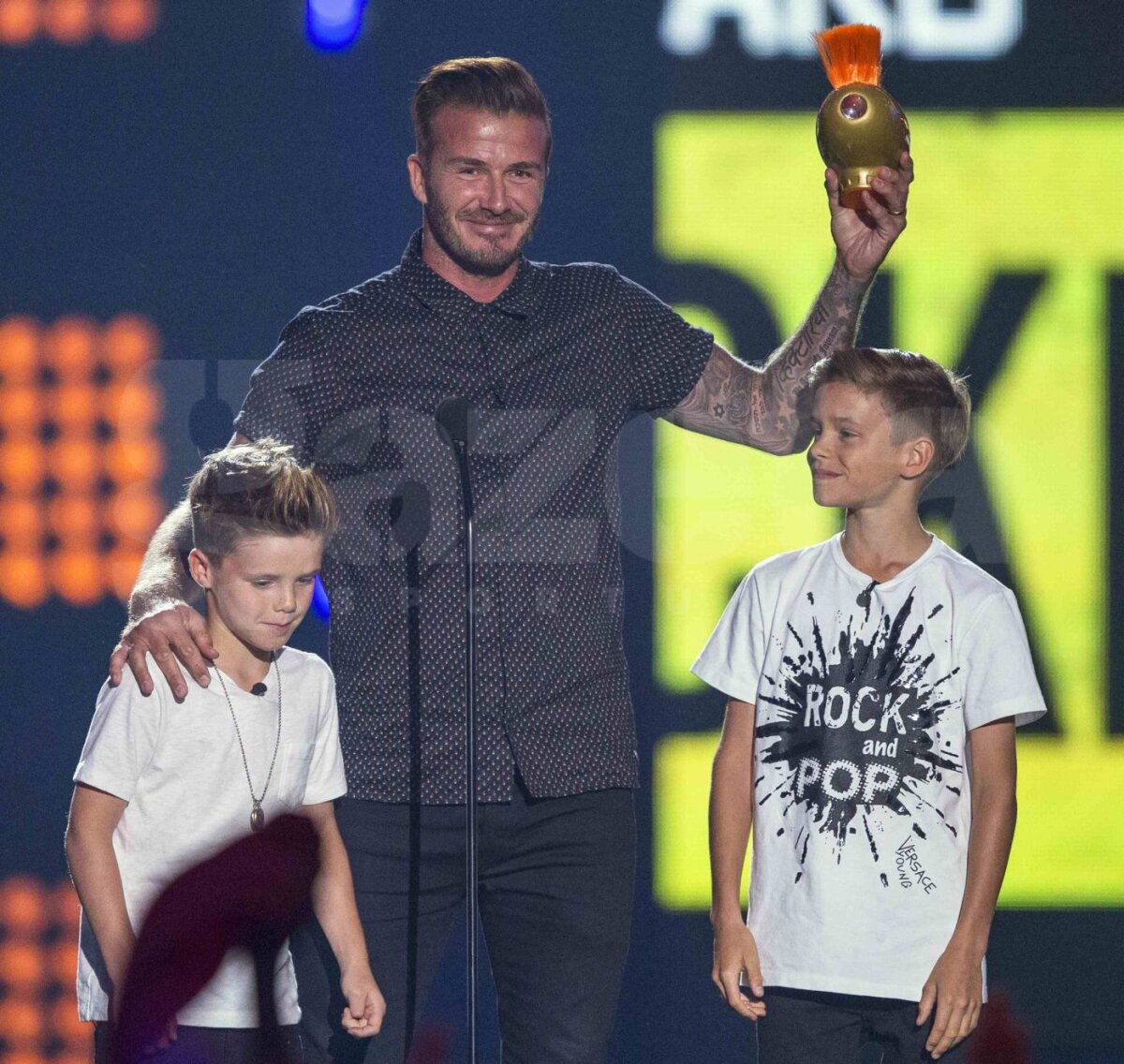 FOTO Auriţi! » Surpriză pentru David Beckham şi băieţii săi la premiile Nickelodeon