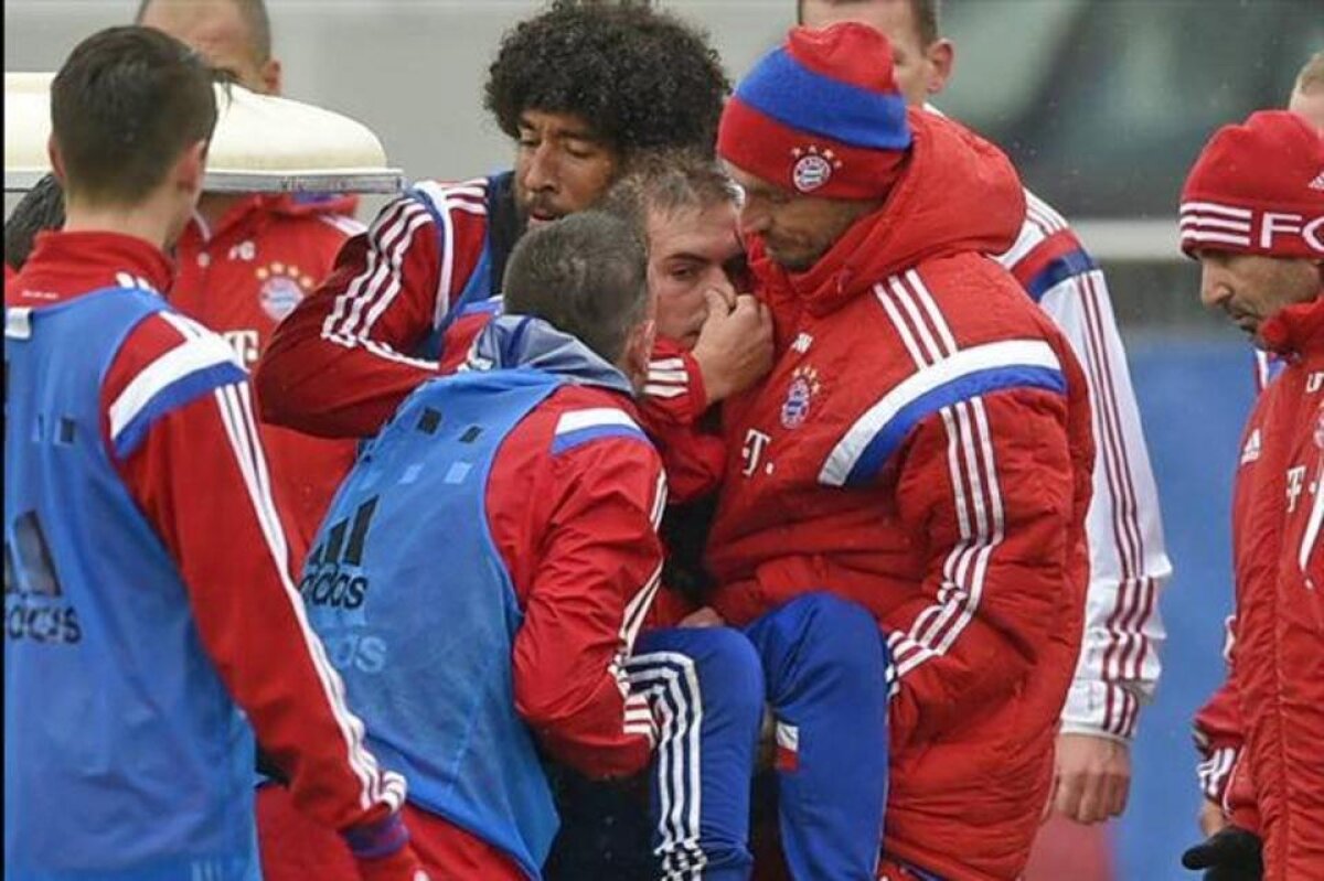 FOTO » Philipp Lahm şi-a rupt glezna şi a fost cărat pe braţe de colegi! » Va fi operat şi va lipsi o lungă perioadă