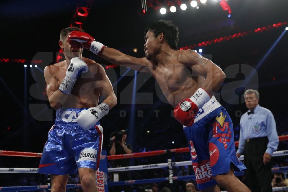 FOTO » Manny Pacquiao, tot mai aproape de un meci cu Floyd Mayweather » Filipinezul l-a învins pe Chris Algieri, după ce l-a trimis de 6 ori la podea!