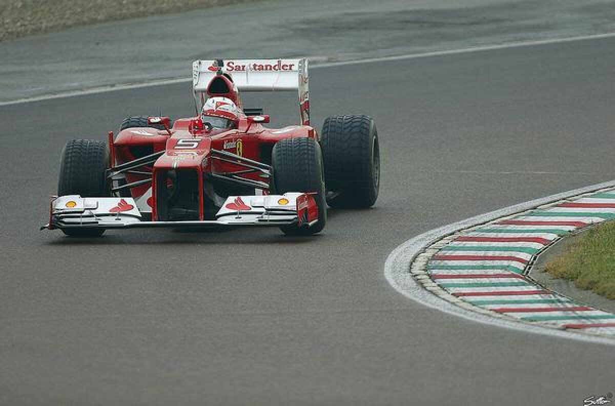 FOTO Primele imagini cu Sebastian Vettel în monopostul Ferrari » Ce mesaj a purtat germanul pe cască