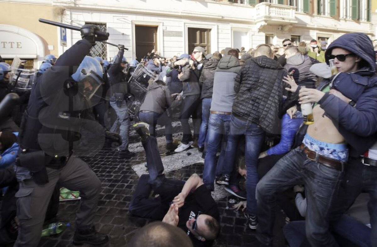 GALERIE FOTO şi VIDEO » Violenţe la Roma » Fanii lui Feyenoord au devastat oraşul şi s-au bătut cu forţele de ordine