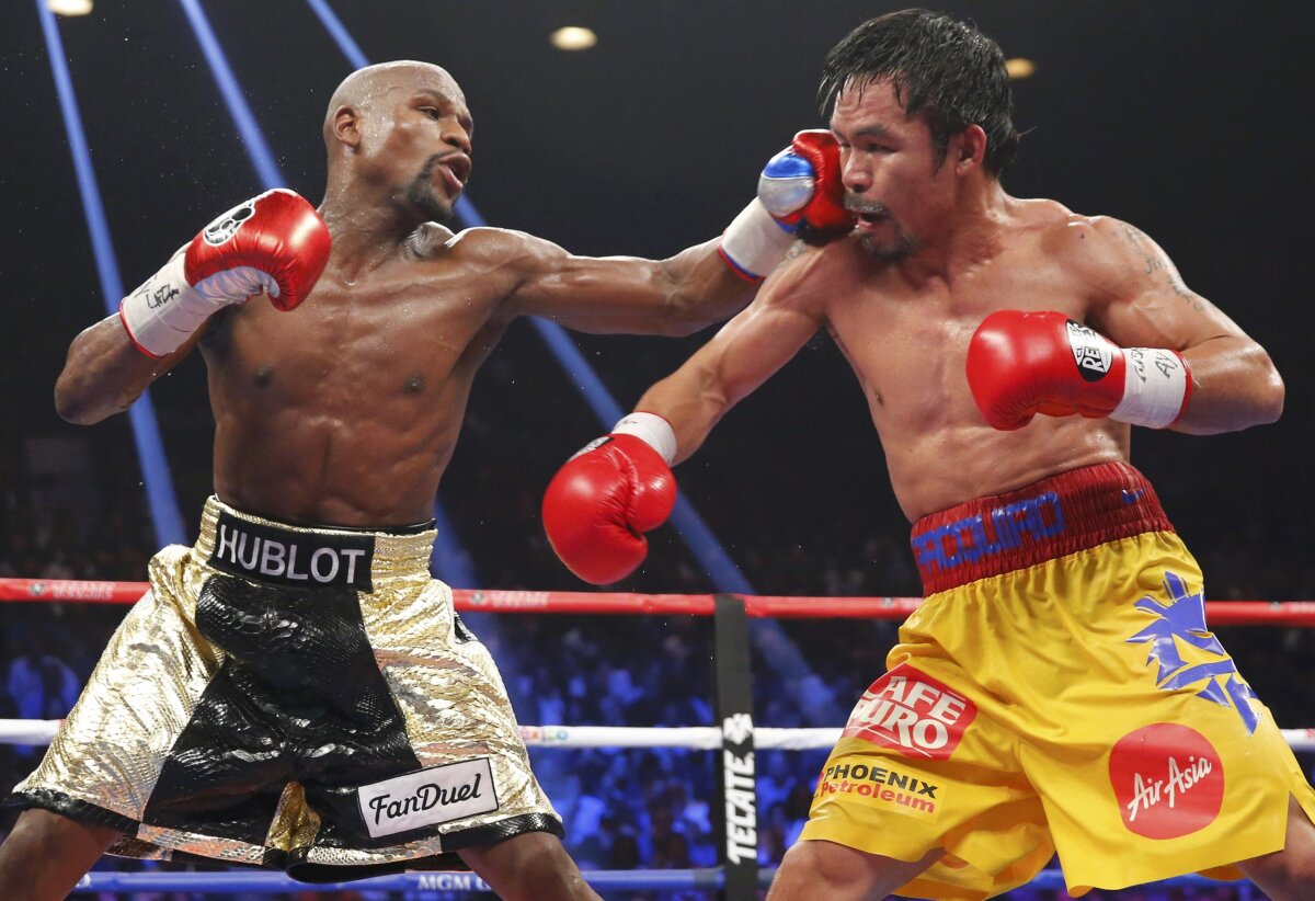 GALERIE FOTO Ai ratat superduelul dintre Floyd Mayweather și Manny Pacquiao? » 30 de imagini de colecție de la "Meciul Secolului"