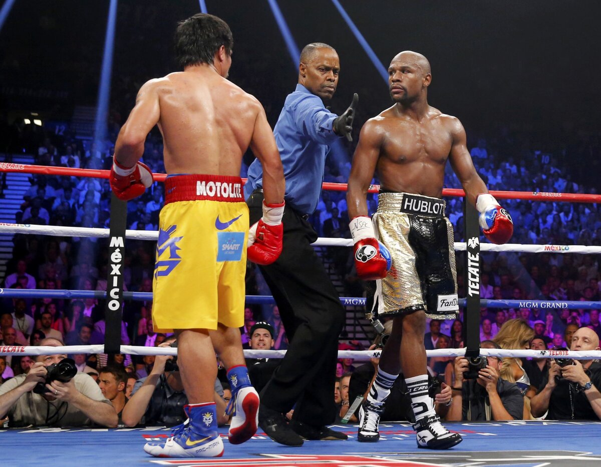 GALERIE FOTO Ai ratat superduelul dintre Floyd Mayweather și Manny Pacquiao? » 30 de imagini de colecție de la "Meciul Secolului"