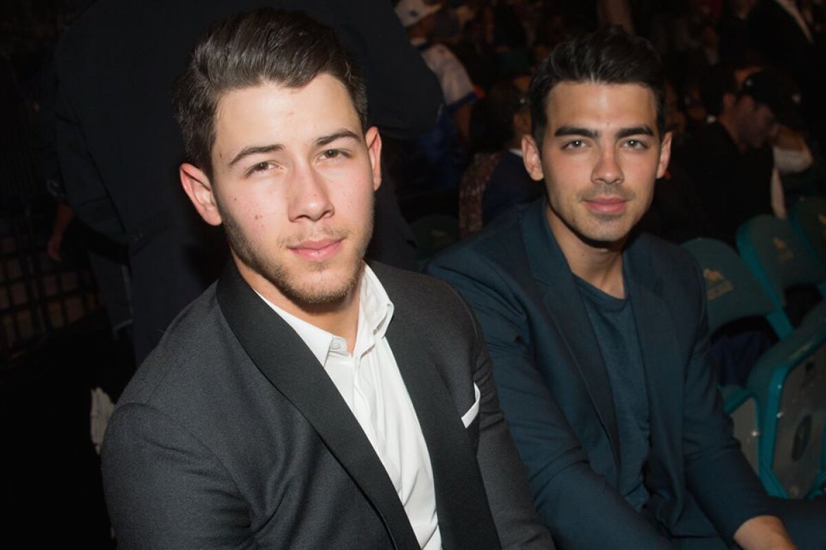 GALERIE FOTO De la Justin Bieber pînă la Michael Jordan » Paradă de staruri la Meciul Secolului