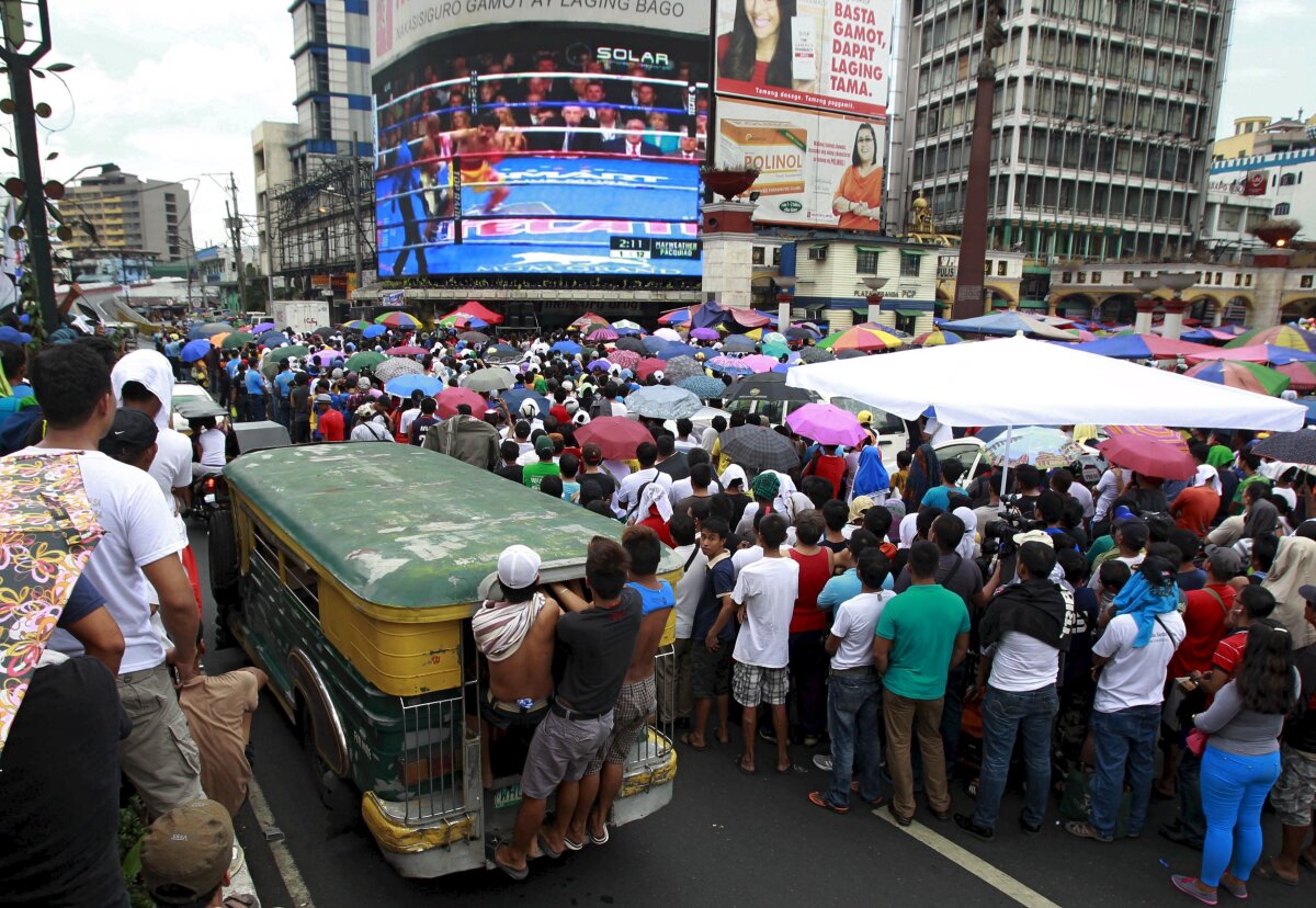 FOTO Ce nu se știe de la Meciul Secolului: isterie pe străzile din Manila și cît a cîștigat 50 Cent la pariuri 