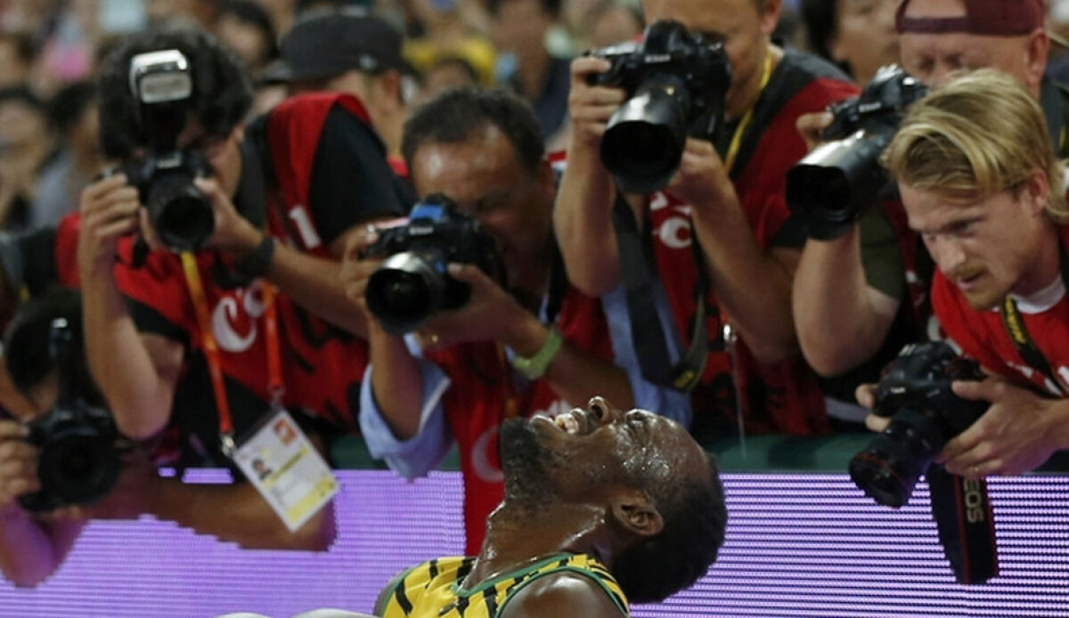 VIDEO+FOTO Panică pentru Bolt la Beijing! Un cameraman putea să-l accidenteze grav pe cel mai rapid om al planetei