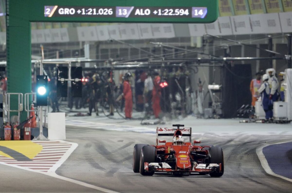 GALERIE FOTO Weekend perfect pentru Vettel! Neamțul s-a impus în MP de la Singapore » Hamilton nu a terminat cursa