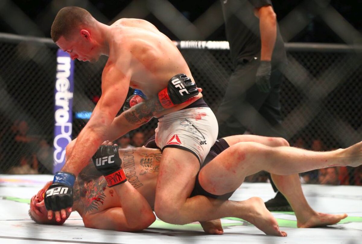 VIDEO + FOTO Spectacol total în UFC » Înfrângere şoc! McGregor şi Holm au pierdut surprinzător