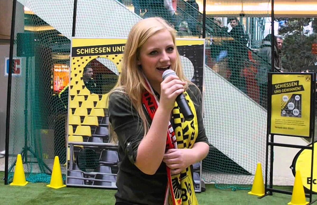 VIDEO&FOTO Povestea de succes a unei microbiste: a cântat imnul lui Dortmund și a obținut un contract de înregistrare