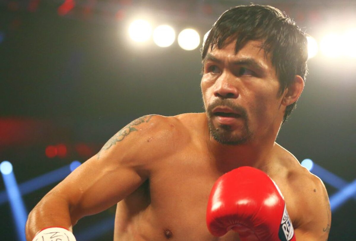    Retragere în glorie » Manny Pacquiao a agățat mănușile în cui după ce l-a învins pe Timothy Bradley