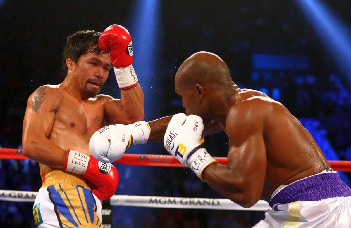    Retragere în glorie » Manny Pacquiao a agățat mănușile în cui după ce l-a învins pe Timothy Bradley