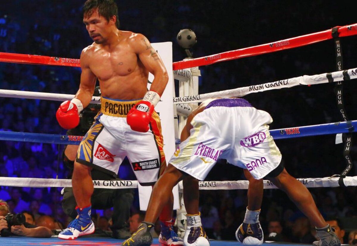    Retragere în glorie » Manny Pacquiao a agățat mănușile în cui după ce l-a învins pe Timothy Bradley