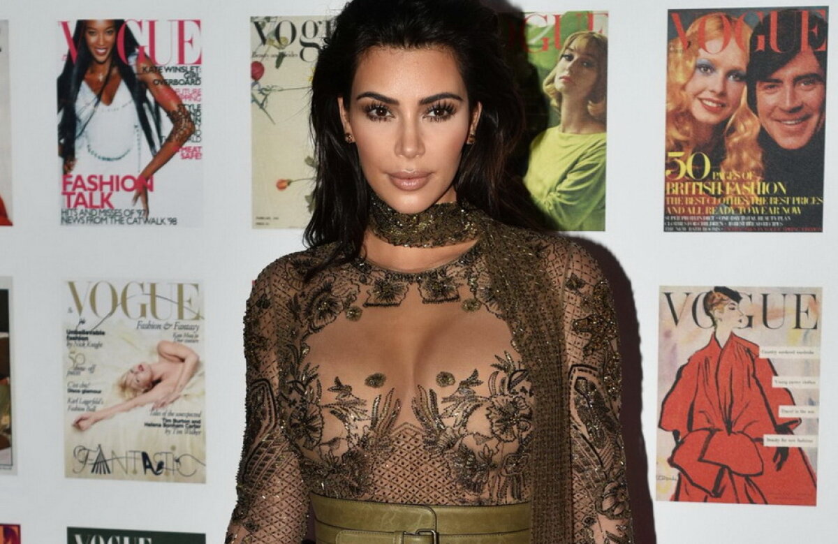 GALERIE FOTO » Kim Kardashian, în cea mai transparentă rochie la un eveniment din Londra!