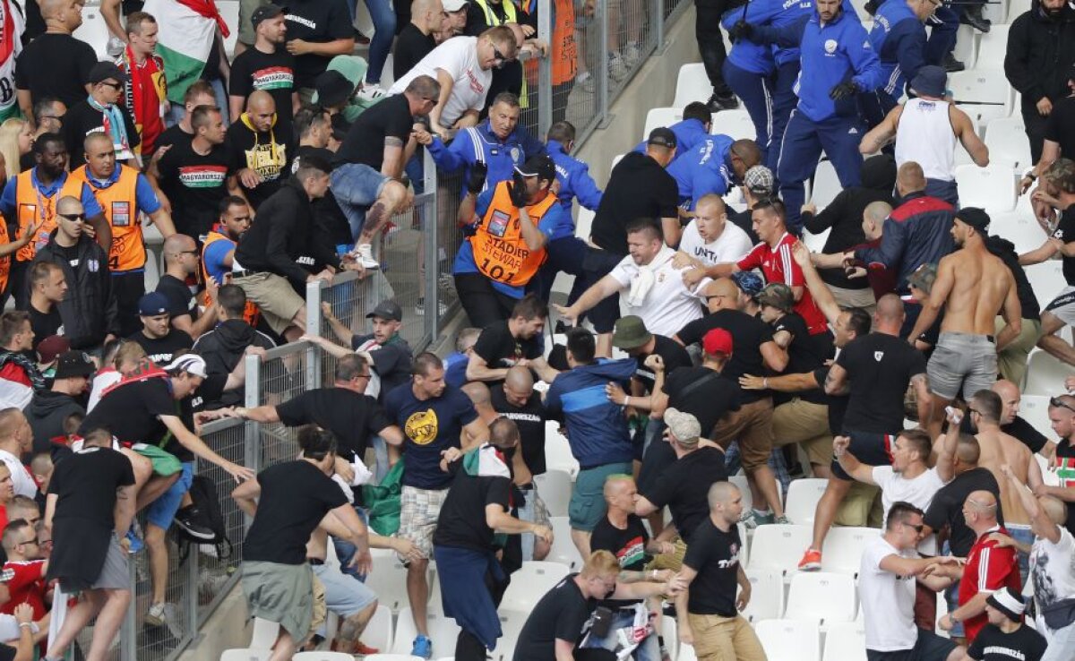 GALERIE FOTO + VIDEO Incidente pe stadion la Islanda - Ungaria! Suporterii s-au bătut și au aruncat cu torțe