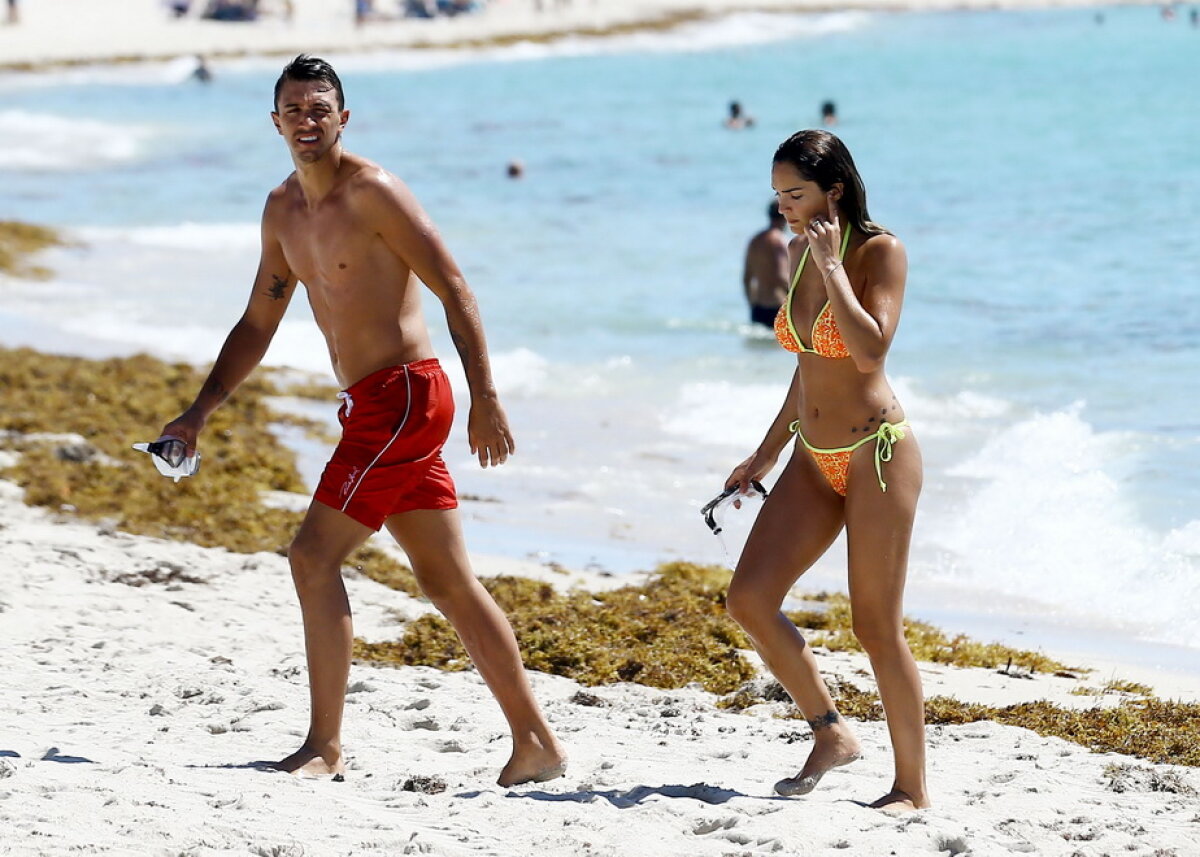 GALERIE FOTO » Iubita lui Fernando Muslera este superbă! A făcut "valuri" în Miami