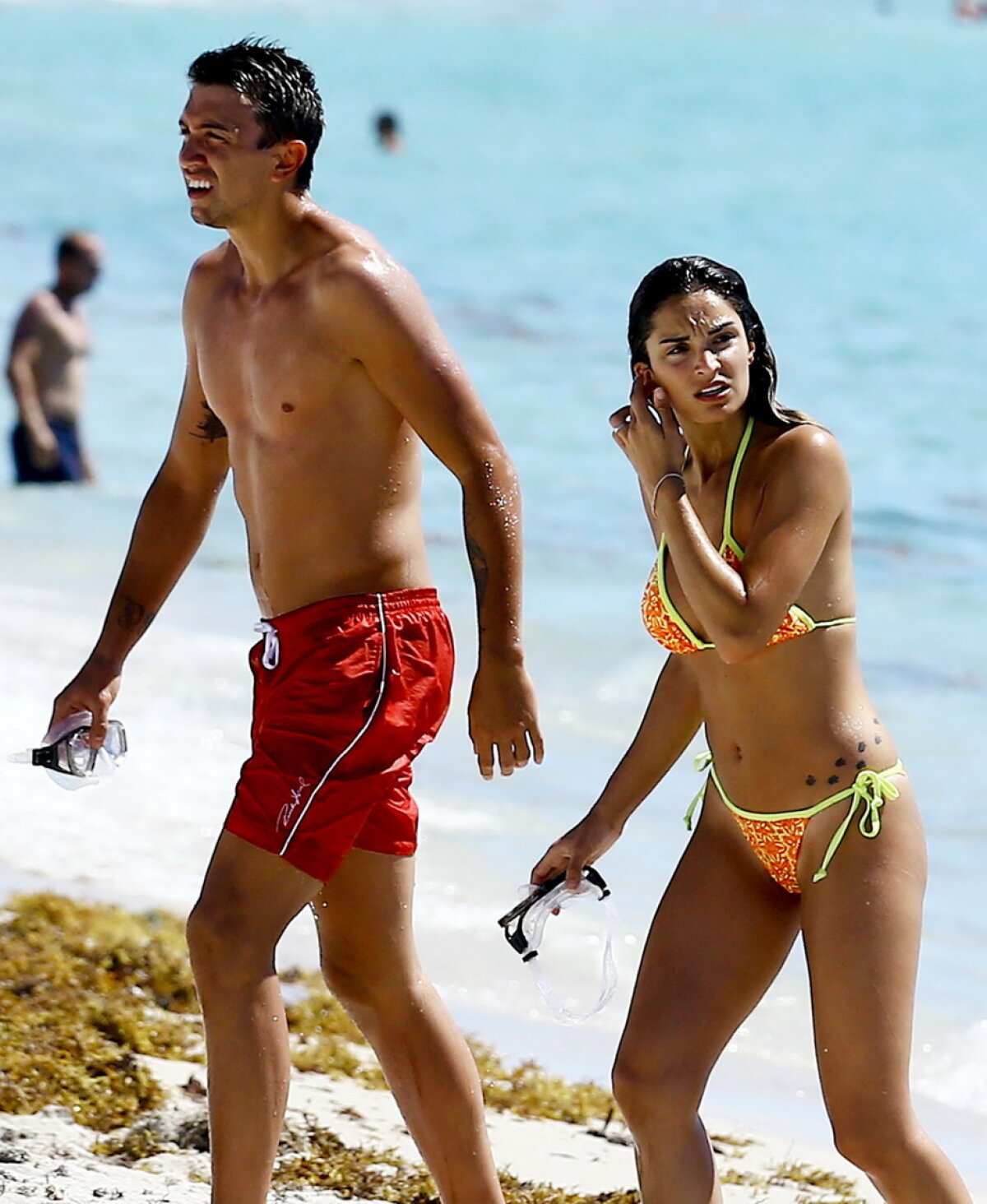 GALERIE FOTO » Iubita lui Fernando Muslera este superbă! A făcut "valuri" în Miami