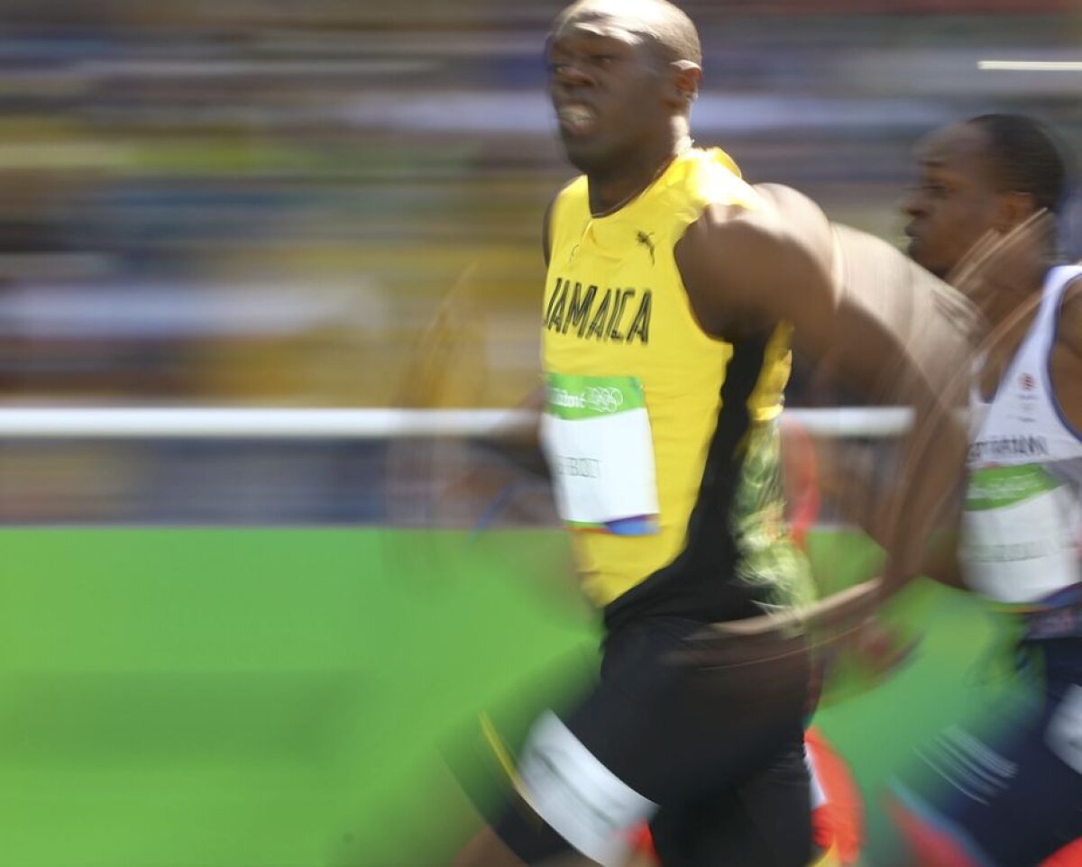 GALERIE FOTO » BLITZ! BLITZ! BLITZ! 20 de imagini de senzaţie cu Usain Bolt care au făcut înconjurul lumii