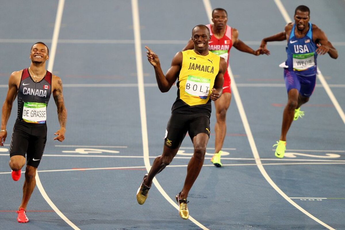 FOTO Moment genial oferit de Bolt în semifinala la 200 de metri » Jamaicanul a terminat cursa certându-și adversarul: "Ce naiba faci?"