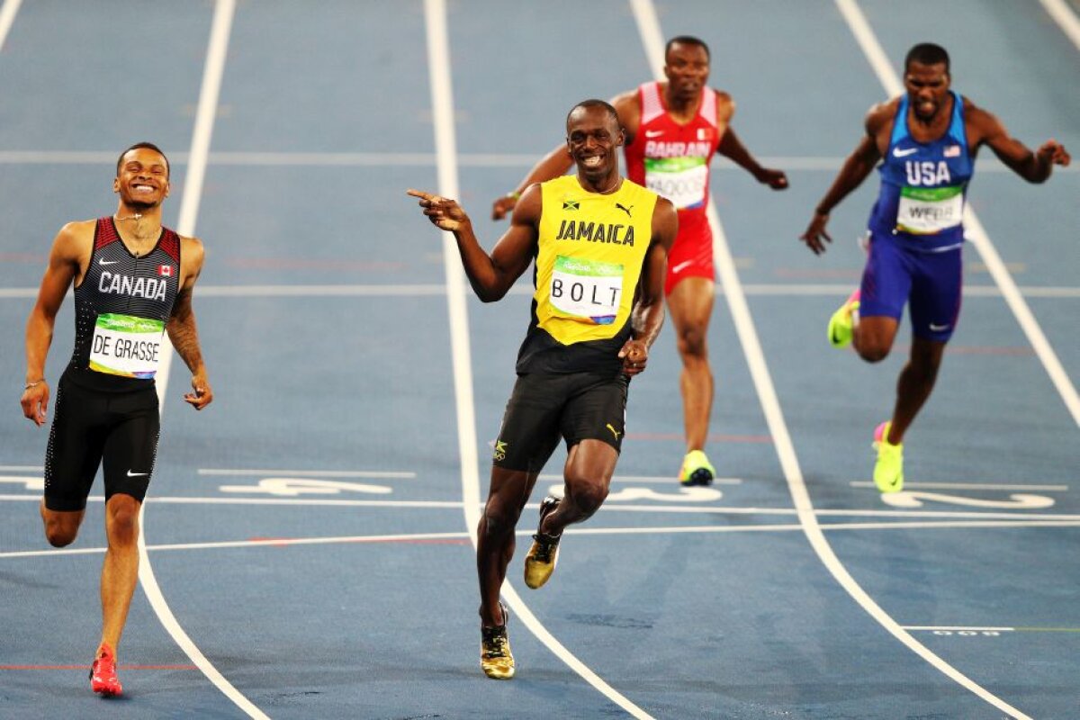 FOTO Moment genial oferit de Bolt în semifinala la 200 de metri » Jamaicanul a terminat cursa certându-și adversarul: "Ce naiba faci?"