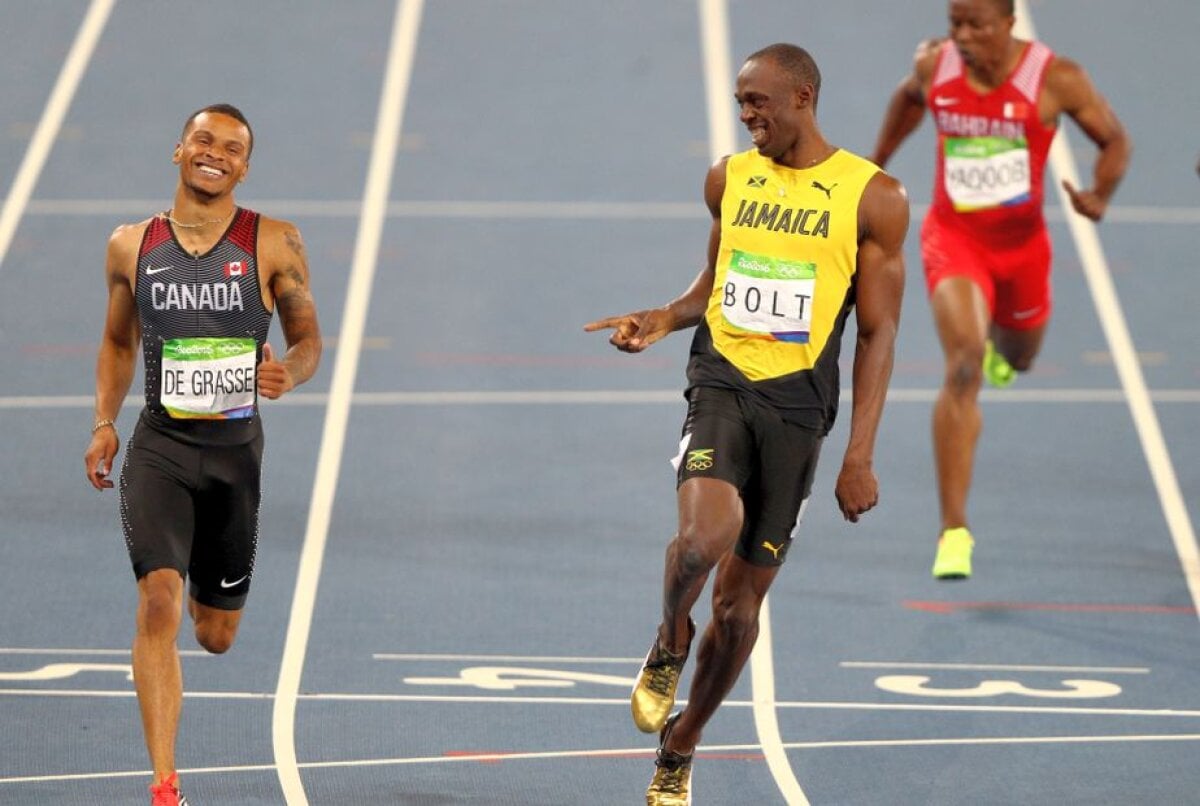 FOTO Moment genial oferit de Bolt în semifinala la 200 de metri » Jamaicanul a terminat cursa certându-și adversarul: "Ce naiba faci?"