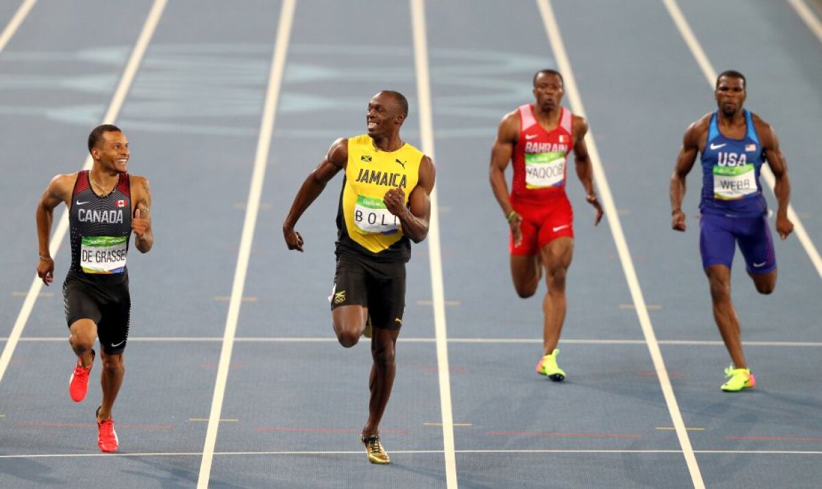 FOTO Moment genial oferit de Bolt în semifinala la 200 de metri » Jamaicanul a terminat cursa certându-și adversarul: "Ce naiba faci?"