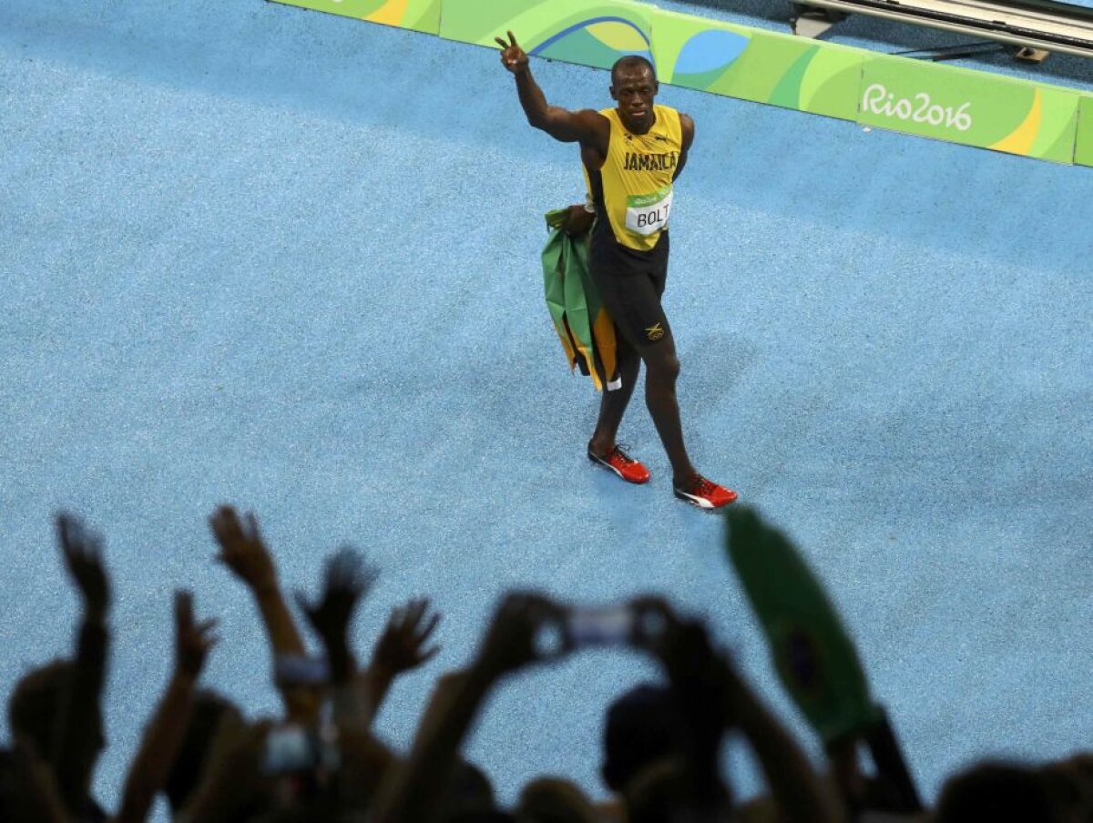 VIDEO+FOTO The Flash » Supremația lui Bolt continuă și la 200m! Încetinit de ploaie, jamaicanul nu și-a putut doborî recordul mondial