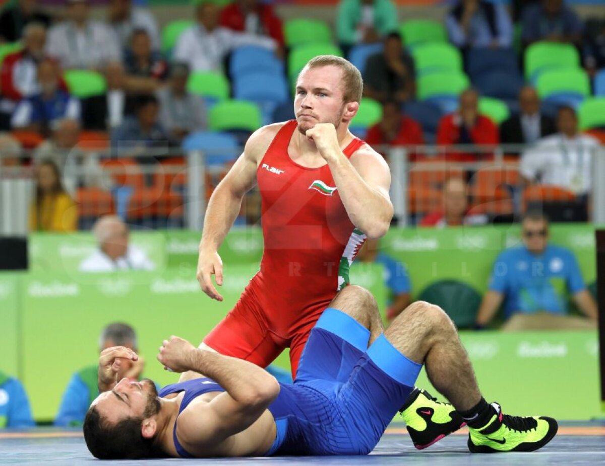 GALERIE FOTO Ivan Guidea a fost învins în sferturile de finală ale probei de lupte libere, categoria 57 de kg 
