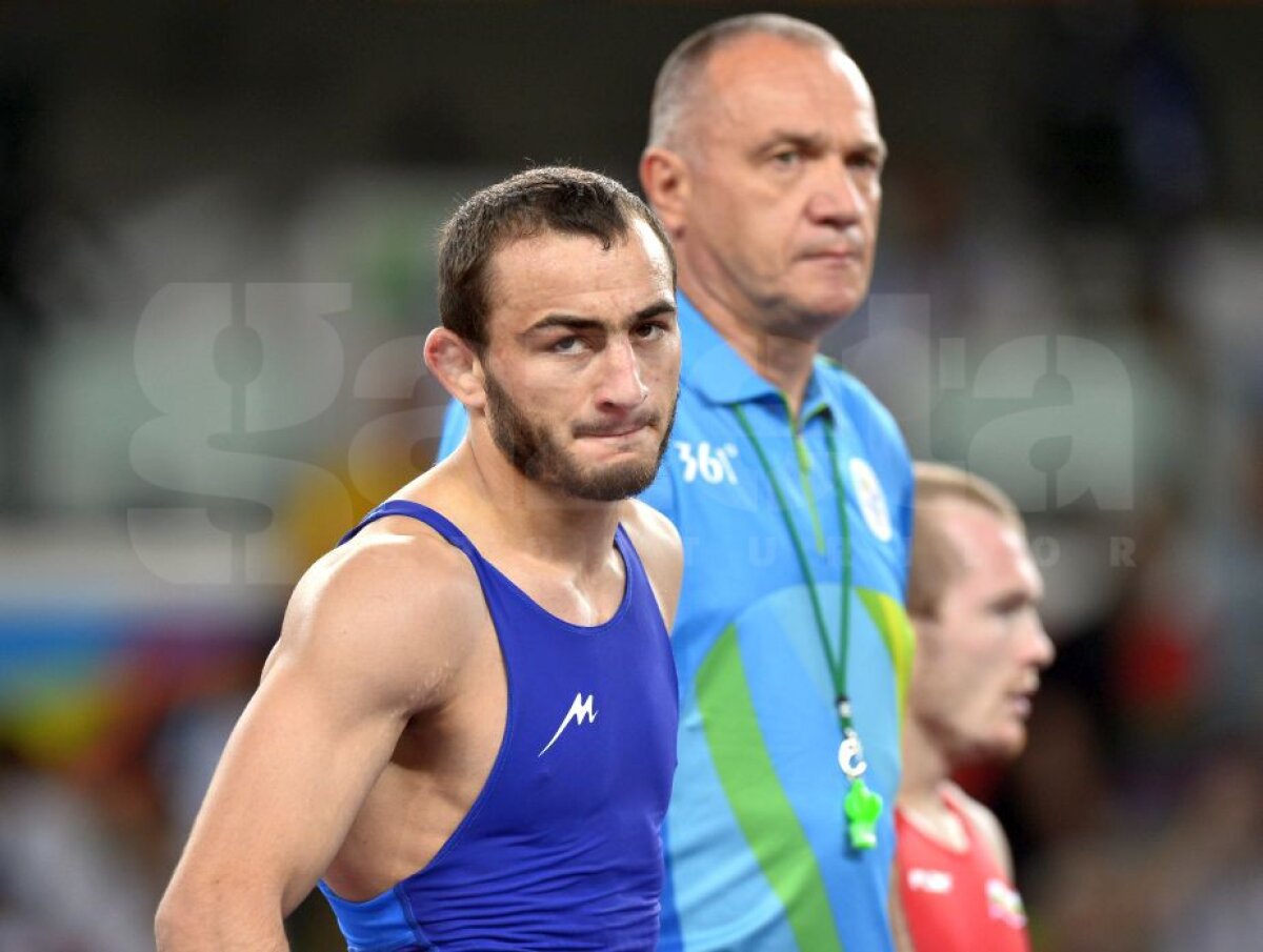 GALERIE FOTO Ivan Guidea a fost învins în sferturile de finală ale probei de lupte libere, categoria 57 de kg 