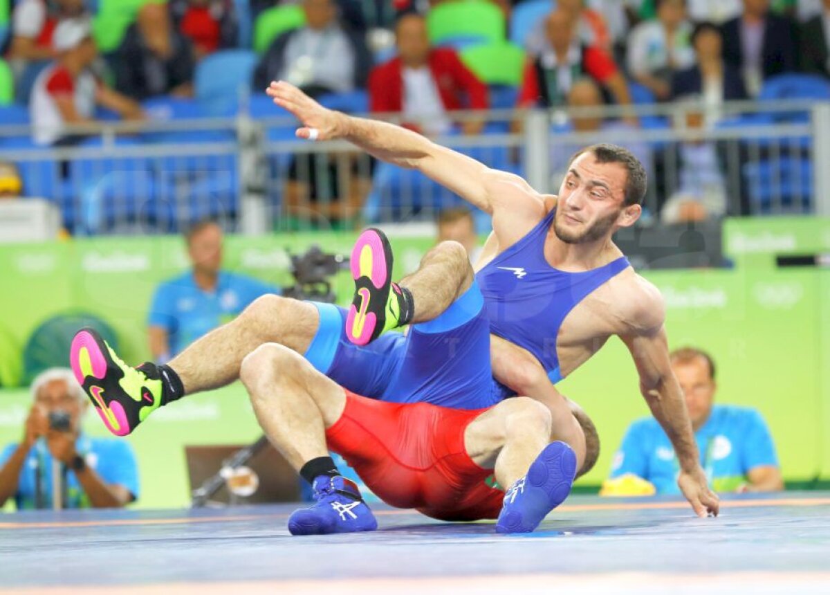GALERIE FOTO Ivan Guidea a fost învins în sferturile de finală ale probei de lupte libere, categoria 57 de kg 