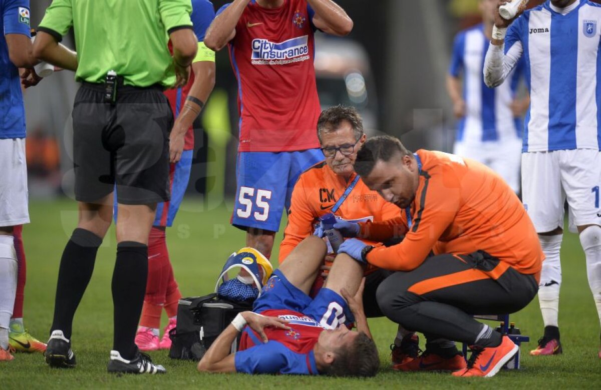 FOTO Probleme pentru Steaua, în prima repriză a meciului cu Craiova! Tănase a ieșit de pe teren accidentat și a fost transportat direct la spital