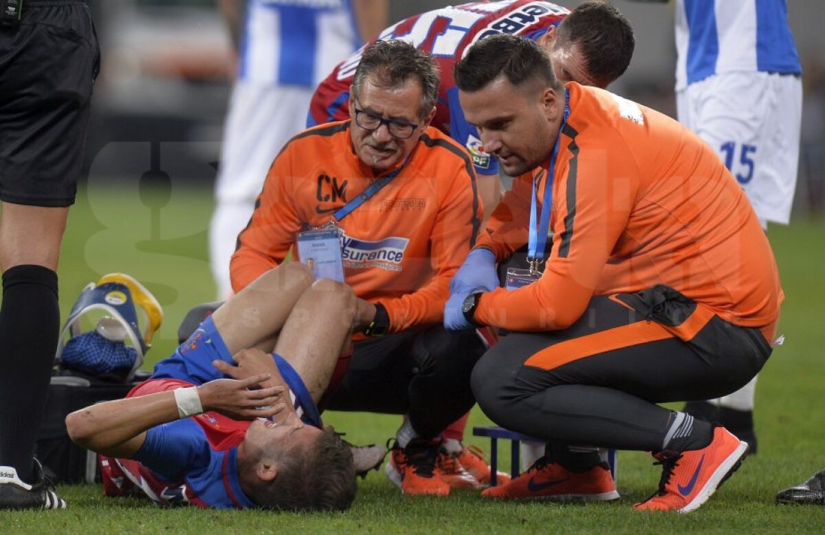 FOTO Probleme pentru Steaua, în prima repriză a meciului cu Craiova! Tănase a ieșit de pe teren accidentat și a fost transportat direct la spital