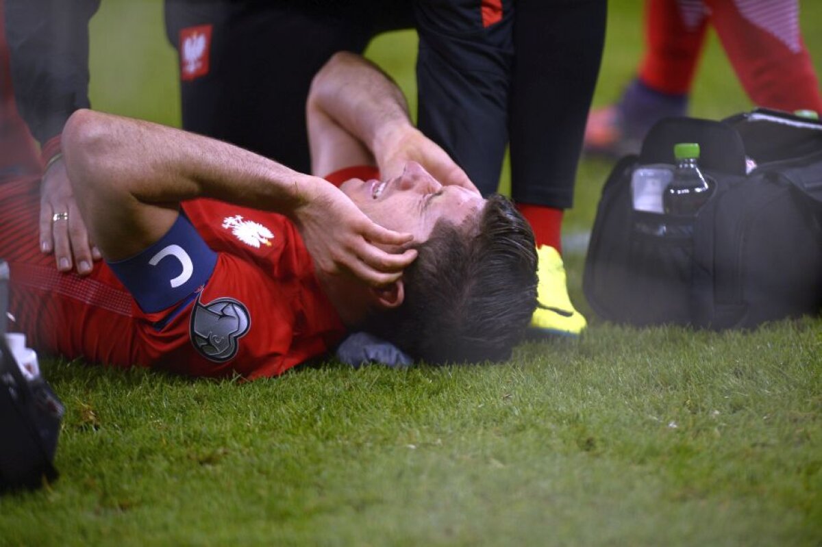 VIDEO+FOTO Două incidente grave în România - Polonia » Lewandowski pus la pământ de petardele românilor