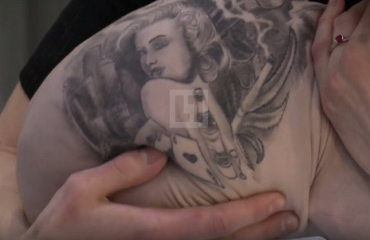 GALERIE FOTO » Un rus şi-a tatuat pisica » Toţi internauţii sunt indignați!