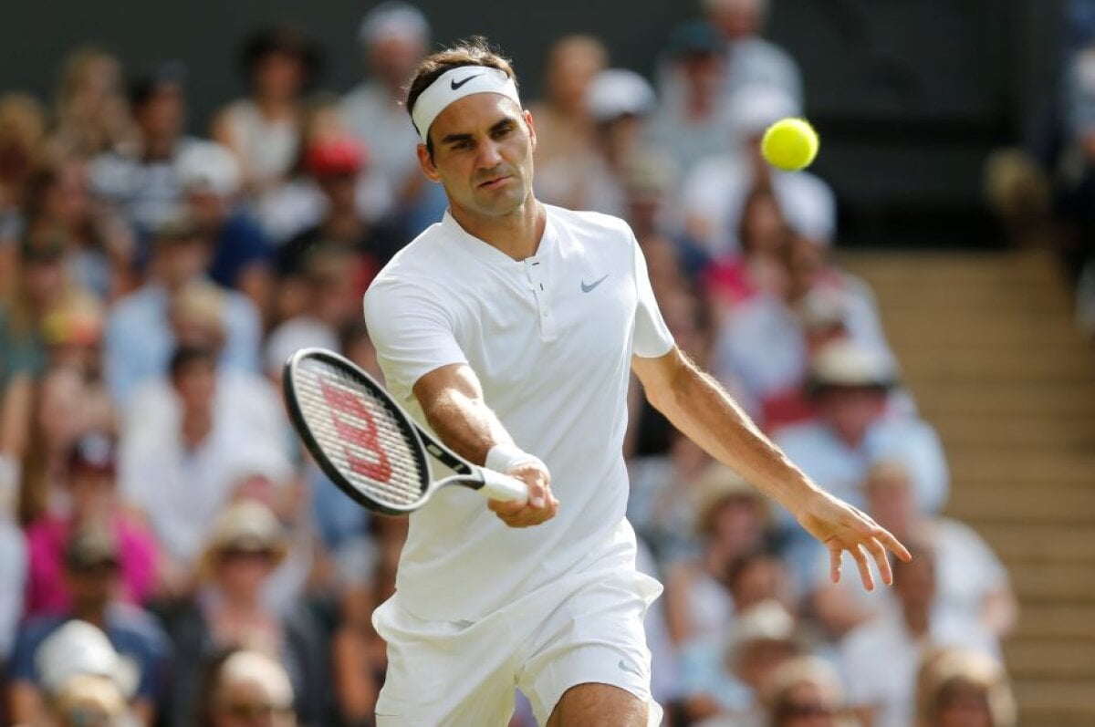 FOTO Wimbledon, ziua 2 » Scenarii identice pentru Djokovici şi Federer: au stat pe teren doar 44 de minute