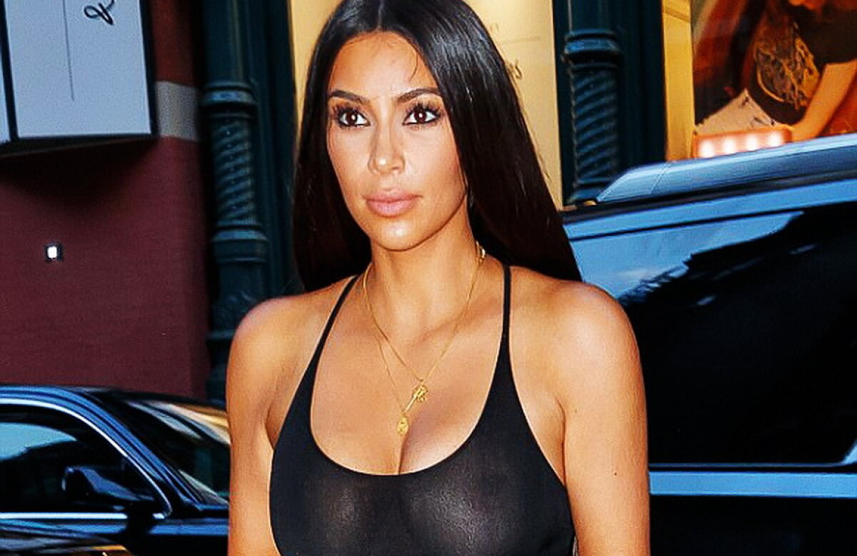 GALERIE FOTO Kim Kardashian, cu sânii la vedere în faţa a zeci de fani