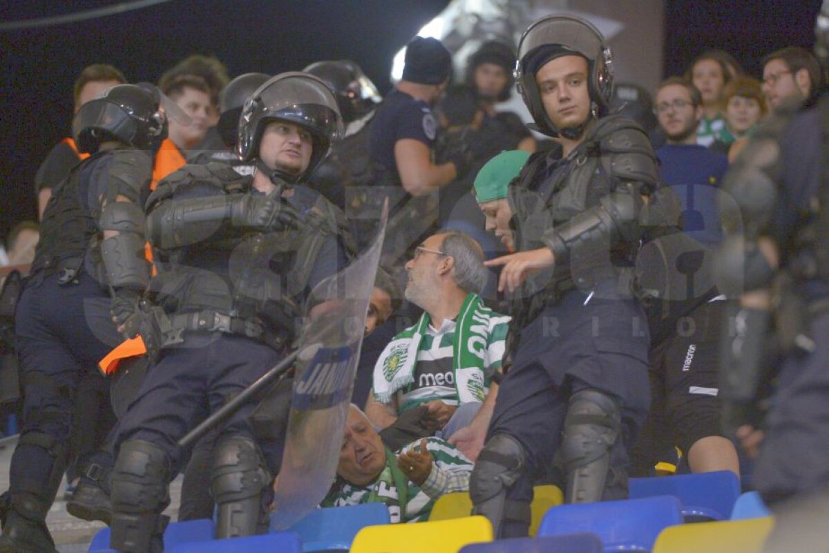 FOTO Incidente în galeria portugheză! Ultrașii lui Sporting au aruncat cu o torță în steliști » Poliția i-a mutat pe fani