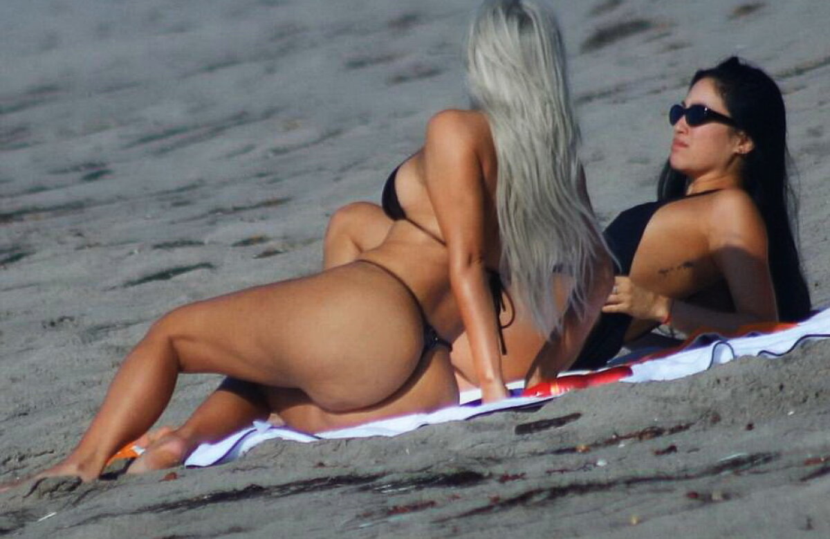 GALERIE FOTO Kim Kardashian, așa cum nu ai văzut-o de mult! A făcut ravagii la plajă în bikini tanga!