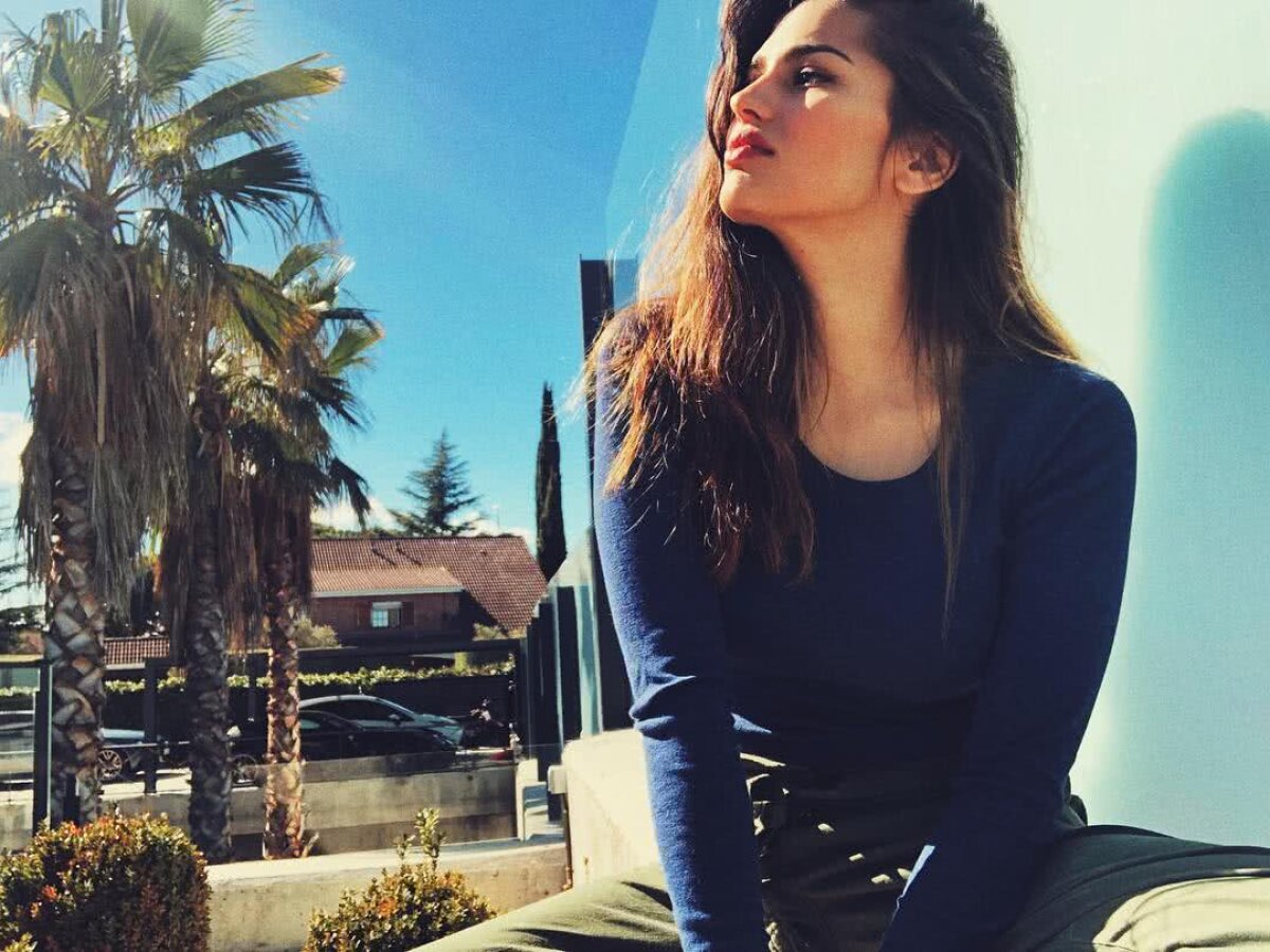 FOTO Amenințată cu moartea de fanii lui Real » Ea e acuzată că lasă fără vlagă o vedetă a "galacticilor"!