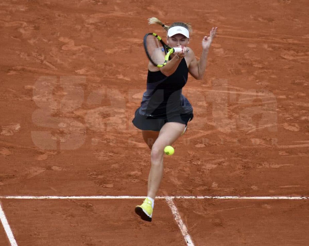 GALERIE FOTO Fără emoții » Rivala Simonei Halep a ajuns în "optimile" de la Roland Garros: adversară de coșmar pentru daneză