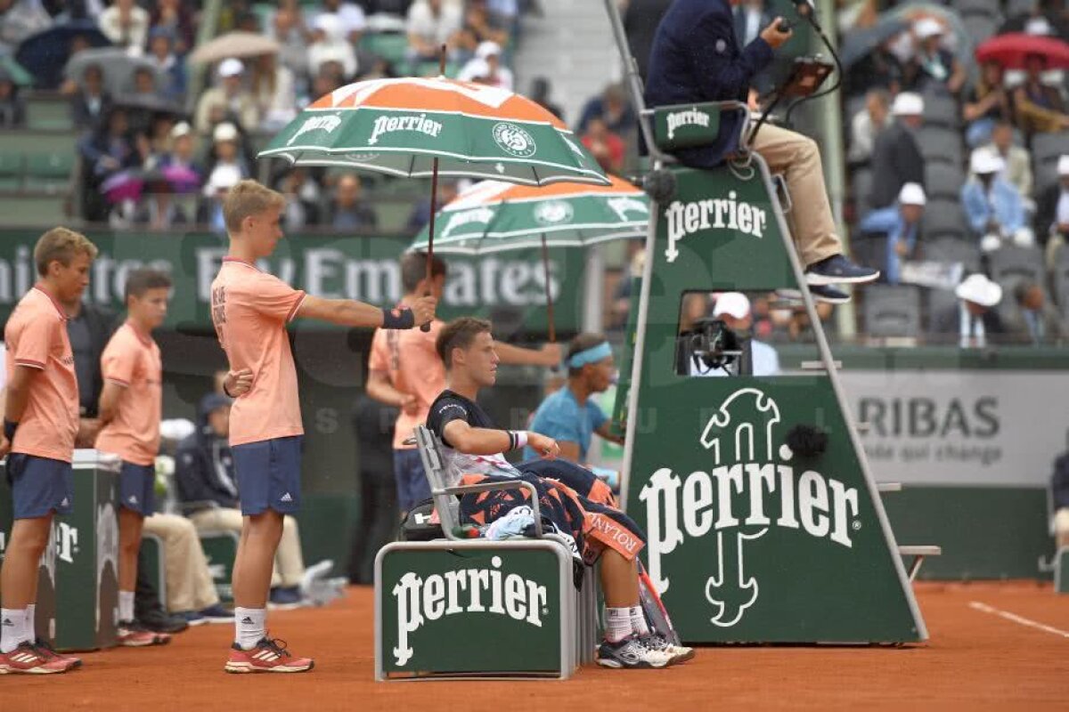 ROLAND GARROS // Rafael Nadal, salvat de ploaie în meciul din sferturi » Spaniolul a trecut prin momente extrem de complicate