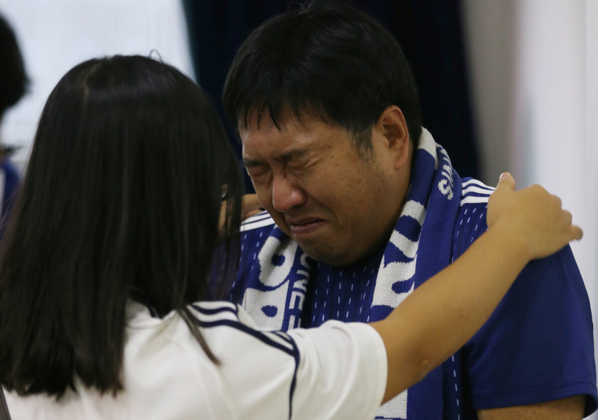 GALERIE FOTO Imagini emoționante pe stadionul din Rostov » Japonezii, DĂRÂMAȚI de durere după eșecul dramatic cu Belgia. Gestul fanilor de la final a impresionat